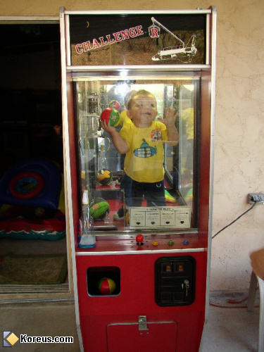 photo enfant à gagner dans jeu pince challenge bébé humour insolite