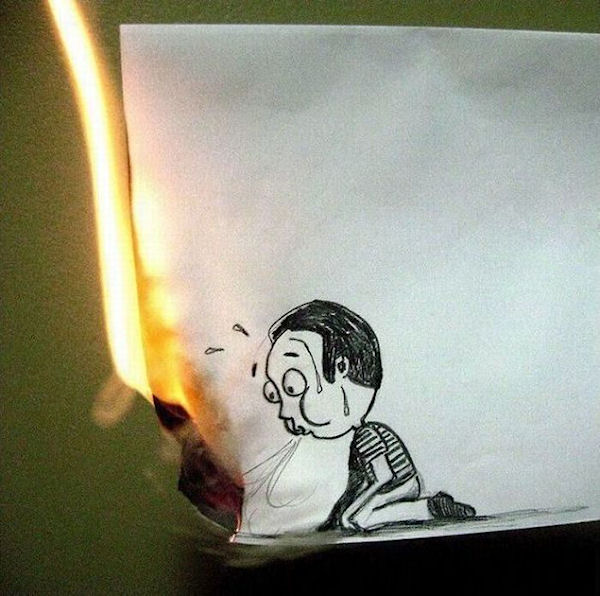 photo humour insolite dessin garçon papier feu