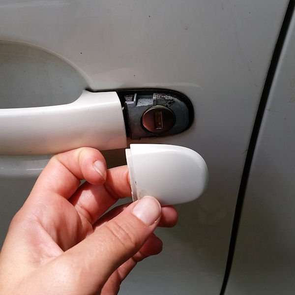 insolite cache poignee portiere serrure voiture