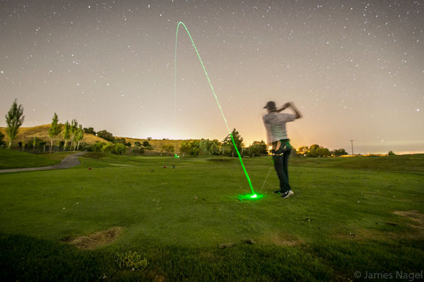 insolite balle exposition golf long swing trajectoire