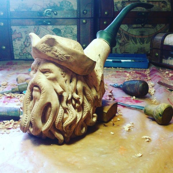 insolite bois caraibe pipe pirate poulpe sculpture visage