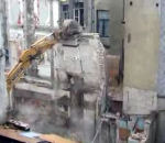 pelleteuse demolition belgique Démolition d'un immeuble habité