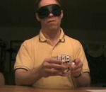 aveugle Mike Hughey résoud un V-Cube 7 en aveugle