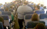obese Un homme obèse voyage en classe éco