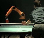 ping-pong match timo Le duel : Timo Boll vs. Robot KUKA