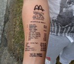 tatouage Tatouage d'un ticket McDo sur le bras