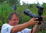 photographe oiseau Prendre un oiseau sur sa tête