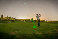 balle trajectoire Swing d'un golfeur en exposition longue