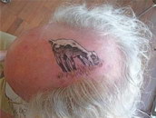 tete tatouage Tatouage pour chauve