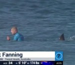 fanning Un surfeur attaqué par un requin en pleine compétition