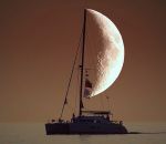 lune Un voilier devant la lune