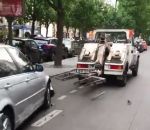 fail voiture remorquage Régis remorque une voiture BMW à Paris