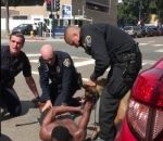 bras Un chien policier ne veut pas lâcher prise pendant une arrestation (San Diego)