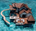paradie reveil Réveil dans une villa avec toboggan aux Maldives