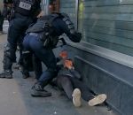manifestant Un manifestant frappé au sol par un policier (Gilets jaunes #62)