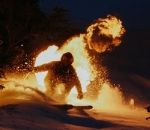 reve « Rêve consumé », un skieur en feu dévale la montagne