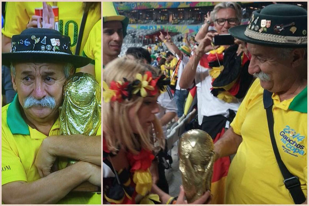 Le supporter brésilien triste donne sa coupe à une supportrice allemande