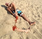 jambe Jambe coupée sur le sable (Illusion)
