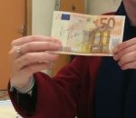 vote enveloppe euro Un billet de 50 € pour Penelope dans un bulletin de vote