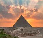 soleil coucher Coucher de soleil derrière la Pyramide de Khéphren