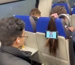 cheveux telephone train Suspendre son téléphone dans un train